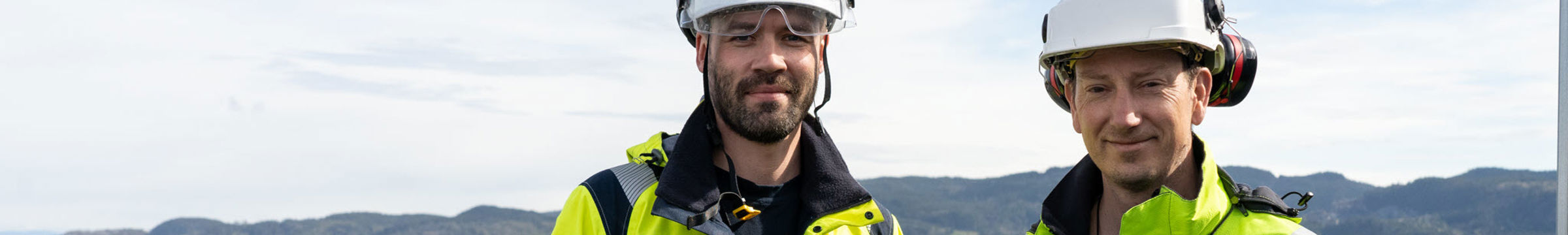 2 menn i arbeidsklær